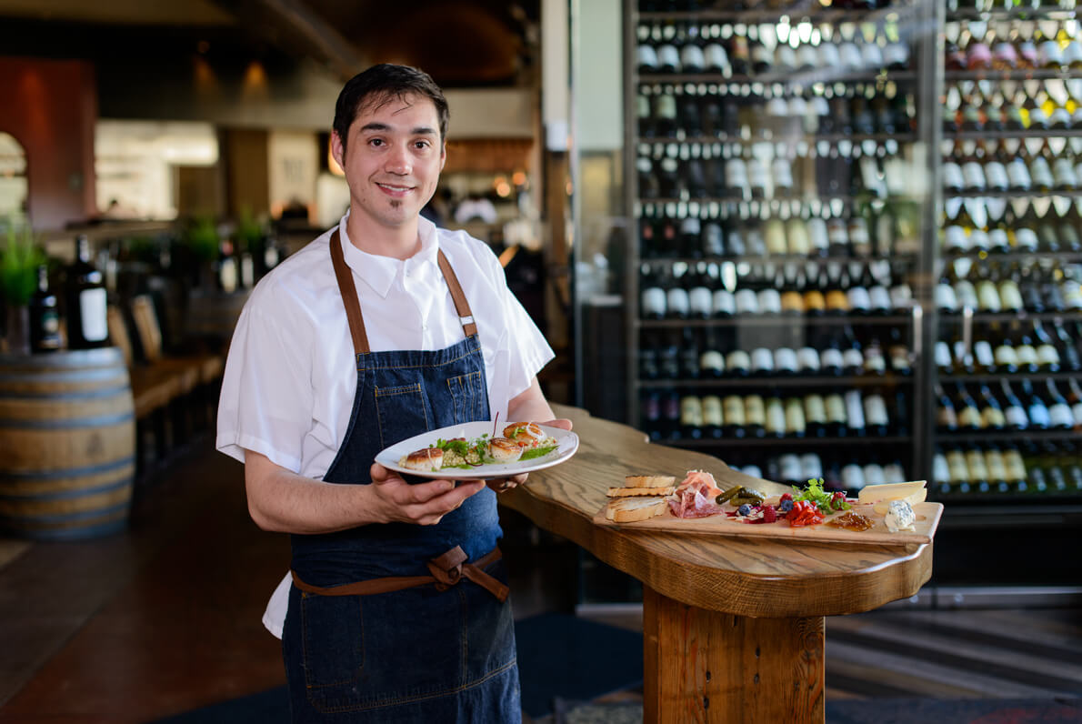 Resturant worker shows food